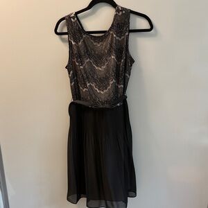 Ladies size 8 black lace and pleated dress